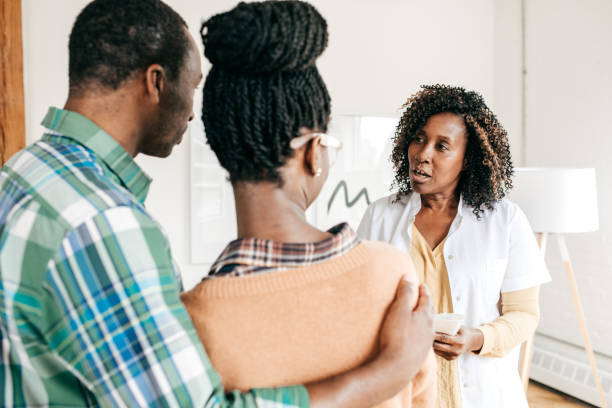 Female doctor discussing with a patients