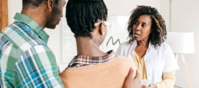 Female doctor discussing with a patients