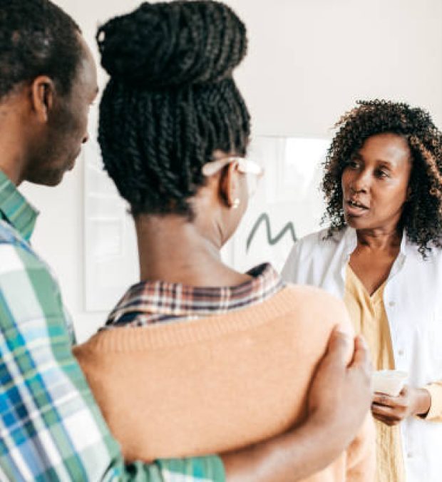 Female doctor discussing with a patients