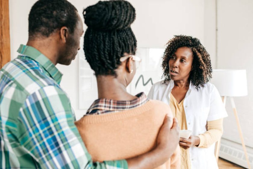 Female doctor discussing with a patients